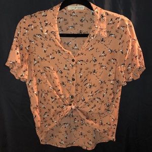Women’s orange bird blouse